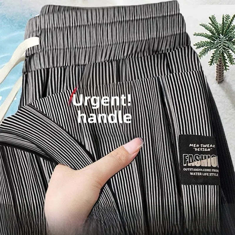 Black and white striped pants with a label on a blurred background