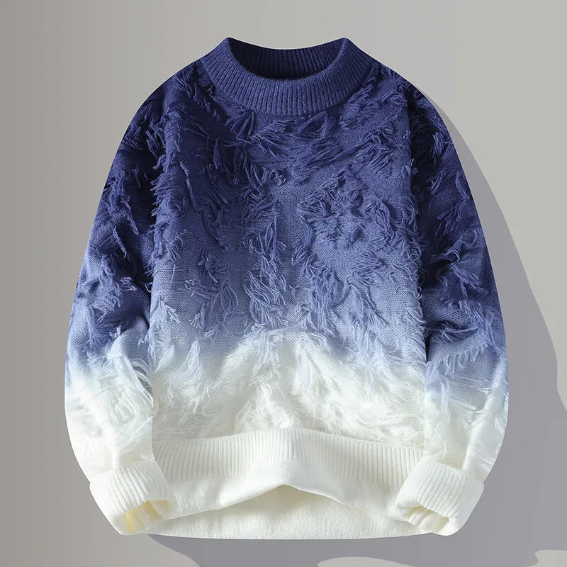 Blue and white textured sweater on a gray background