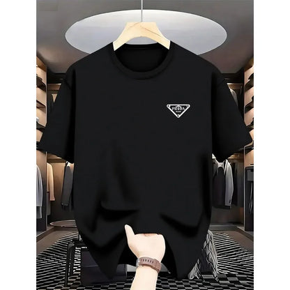 Black t-shirt with a logo on a hanger in a store setting