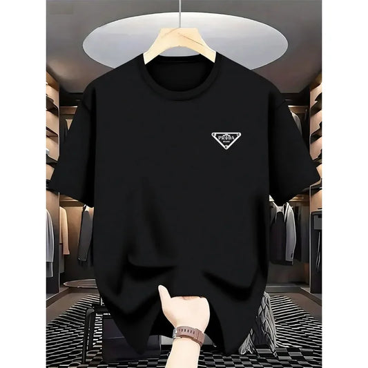 Black t-shirt with a logo on a hanger in a store setting