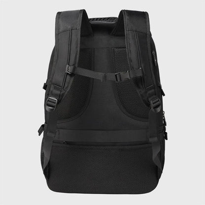 Black backpack on a light gray background