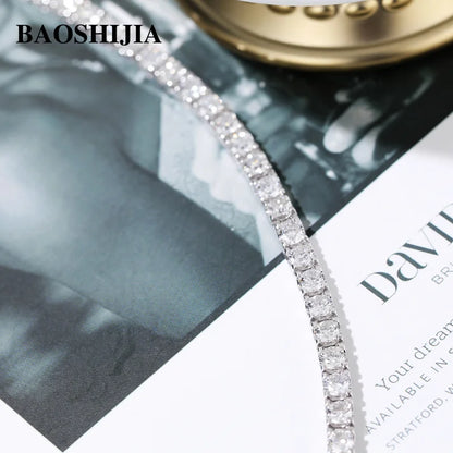 Diamond bracelet on a magazine with BAOSHIJIA branding
