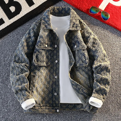 Denim jacket on a mannequin with sunglasses and a bag in the background
