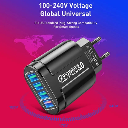 Black power adapter with multiple USB ports on a colorful background