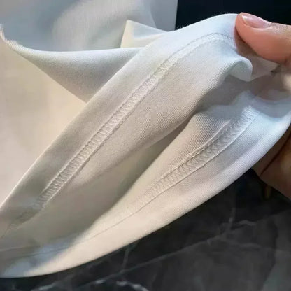 The 2025 New Summer Men's Short-sleeved, Fashionable, Figure-hugging Round-neck T-shirt Is of High-end and Light Luxury