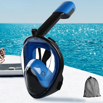 Snorkeling mask with black and blue design on a boat with ocean background