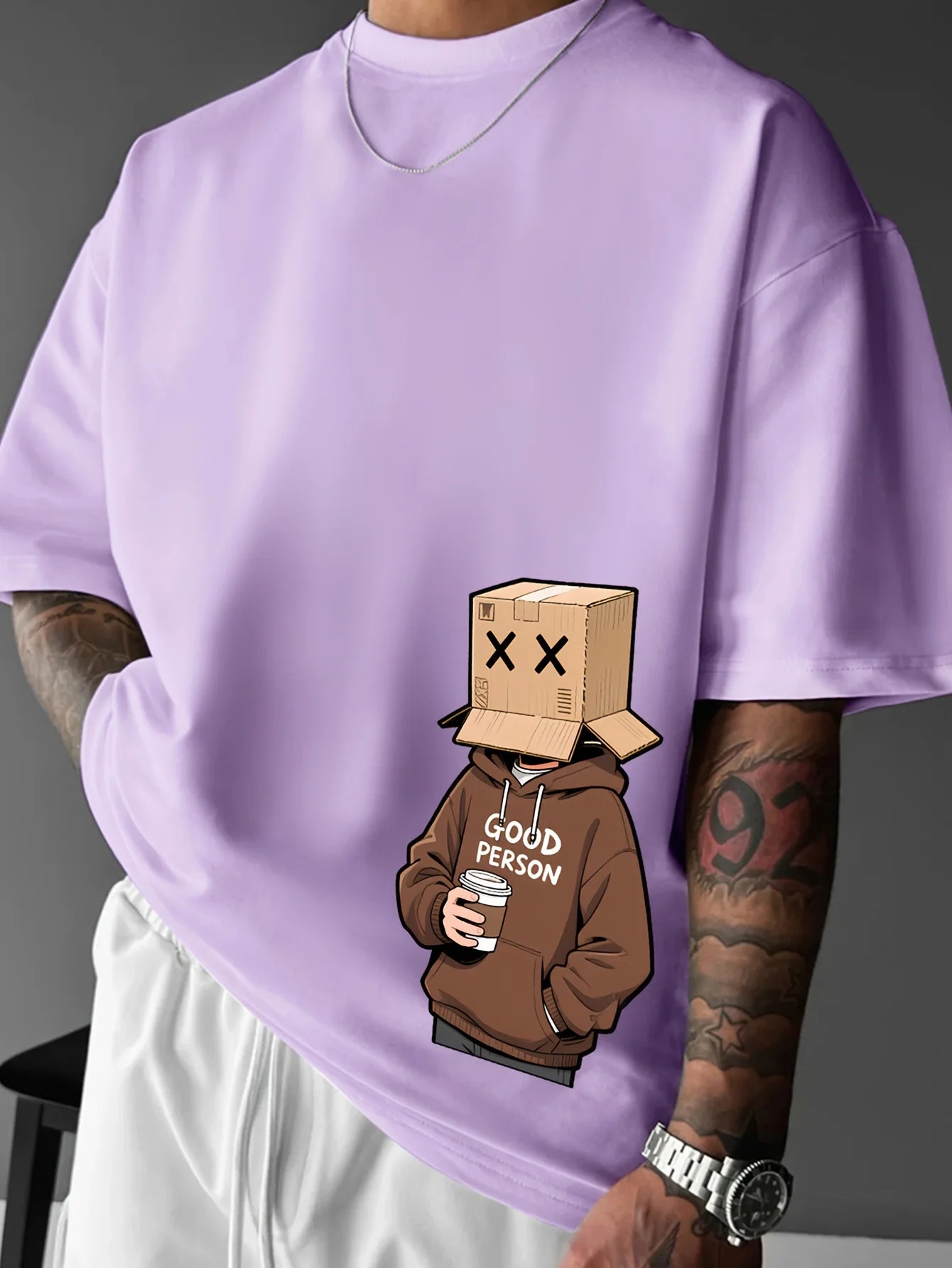 Person wearing a purple sweatshirt with a graphic of a person in a brown hoodie labeled 'Good Person'.