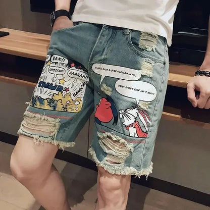 Denim shorts with comic-style text bubbles and character designs on a wooden surface.