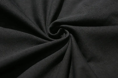 Close-up of dark gray fabric with folds