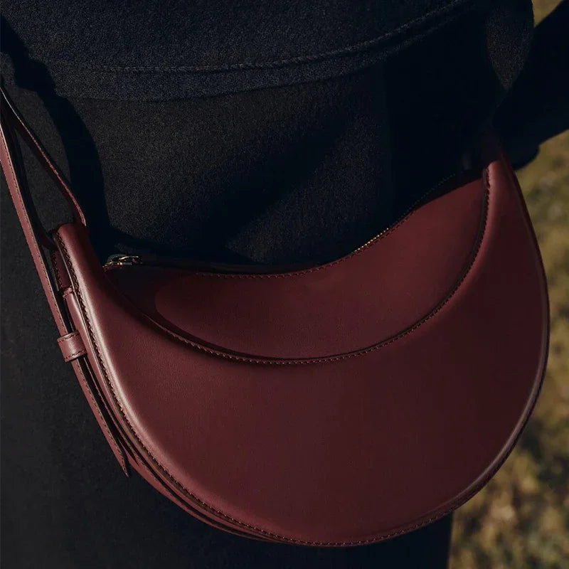 2025 French fashion genuine leather women's shoulder bag, crescent bag, niche design zipper closure shoulder crossbody bag