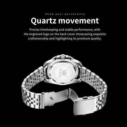 Silver watch with metal strap on a black background, featuring text about quartz movement.