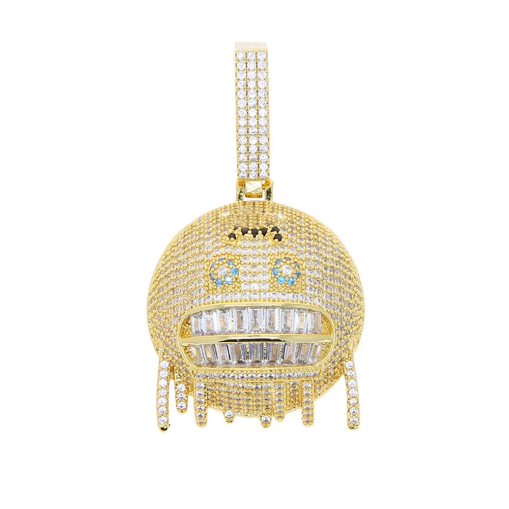 Gold pendant with gemstones on a white background