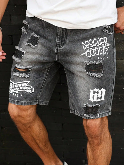 Distressed denim shorts with branding on a dark background