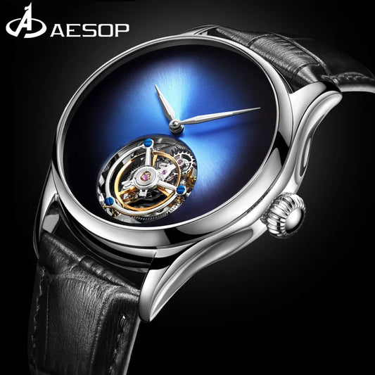 A close-up studio shot of an AESOP wristwatch with a polished silver-tone case, a deep blue sunburst dial, visible tourbillon movement through the center, and a black leather strap on a black background.