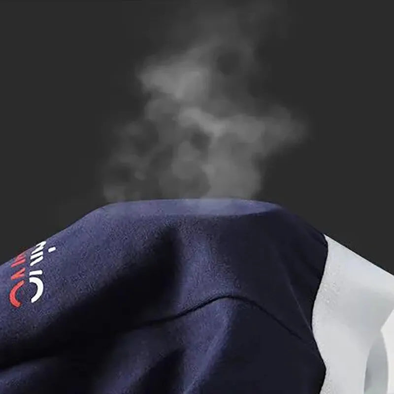 Navy blue jacket with a brand logo on a dark background