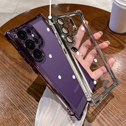 Person holding a phone with a reflective case on a wooden table