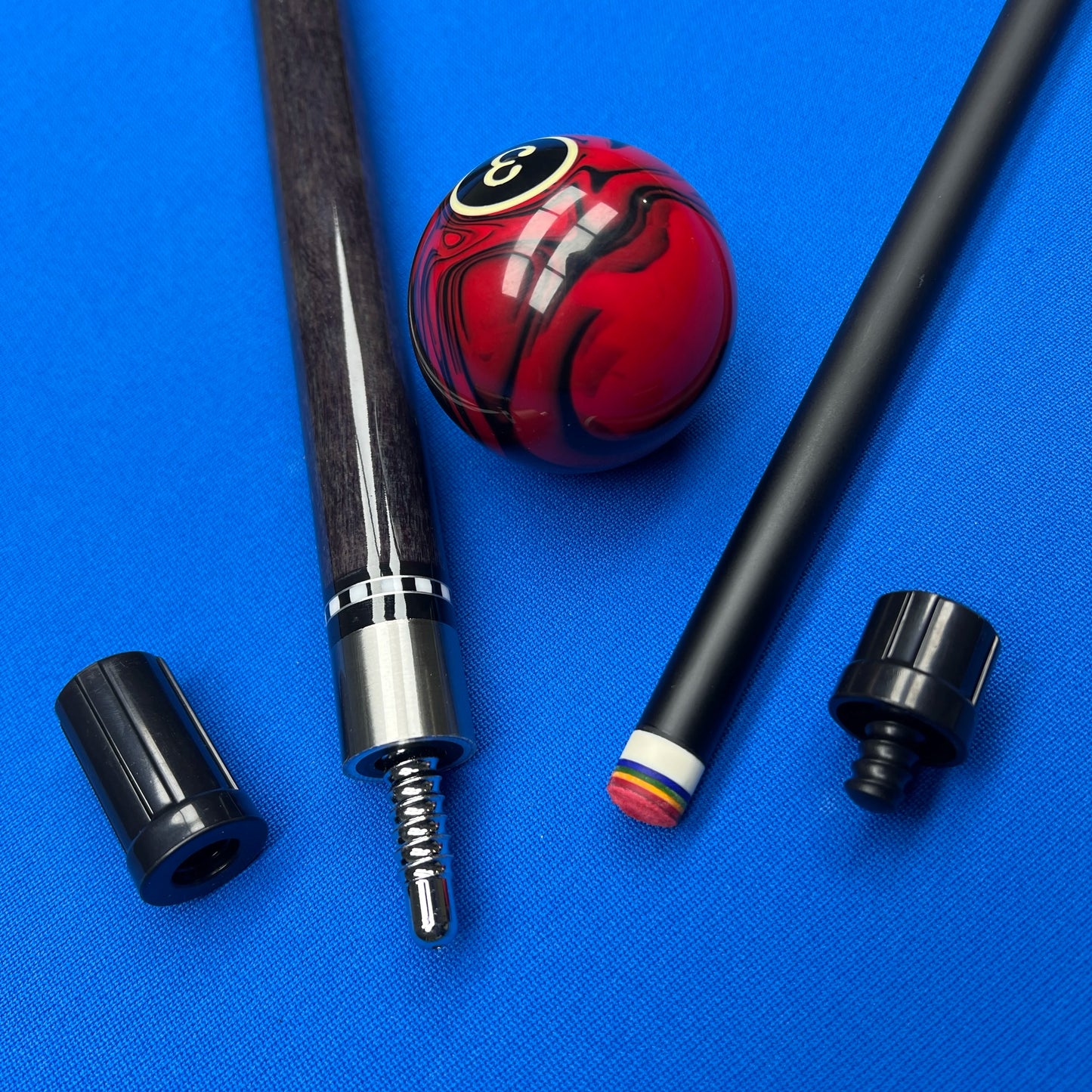 Pool cue and ball on a blue background