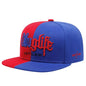 Blue and red cap with 'City of Life Outlaw' text on a white background