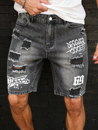 Distressed denim shorts with branding on a dark background