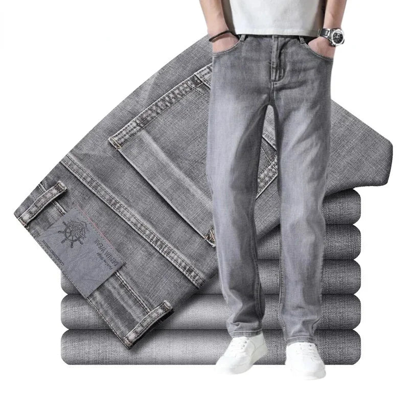 Stack of gray jeans with a person wearing one on a white background