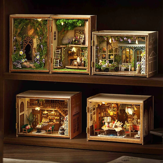 Set of miniature wooden houses with detailed interiors on a shelf.