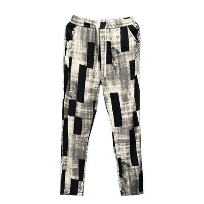 Black and white checkered pants on a white background