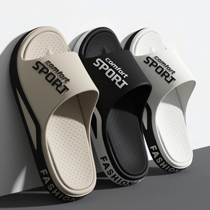 Three slides sandals in beige, black, and white with 'comfort Sport' text on a gray background.