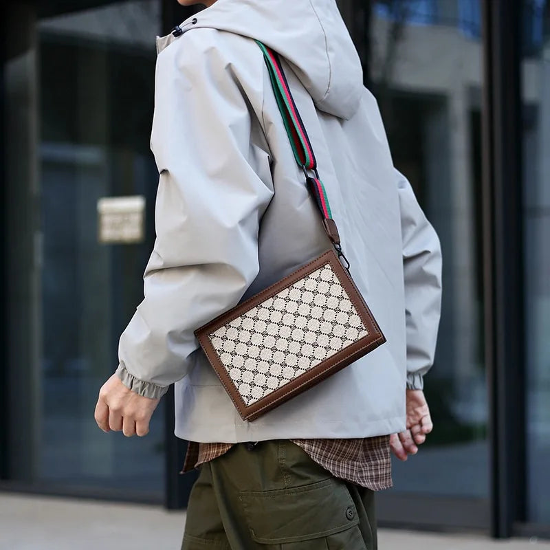 Person holding a patterned bag with a blurred background