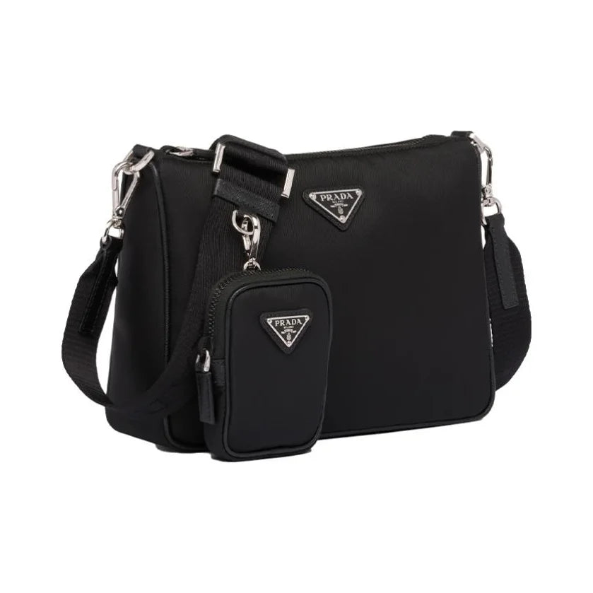 Black Prada handbag with matching pouch on a white background