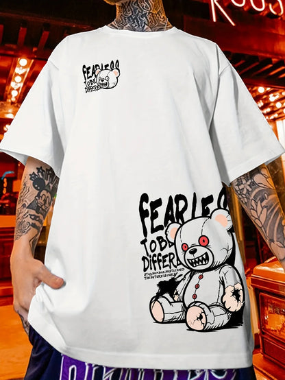 Person wearing a white t-shirt with a graphic design and text, set against an indoor background.