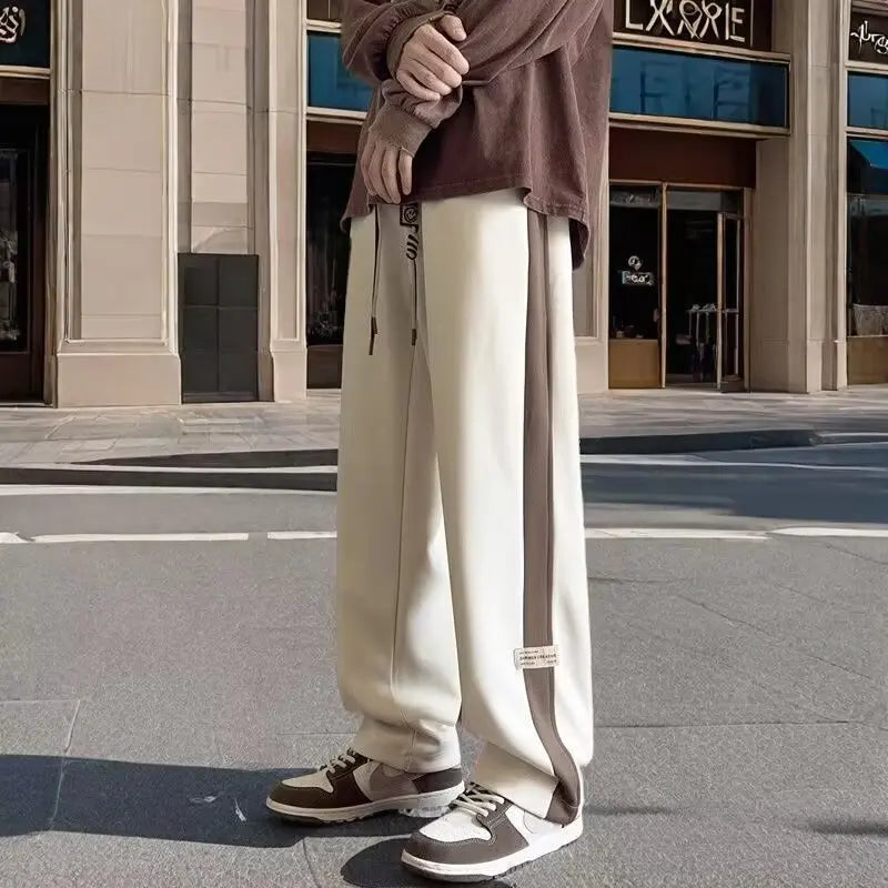 Sanitary pants, color blocked sports pants, lazy teenage season, trendy flu pants, thin men's loose straight leg, relaxed and ha