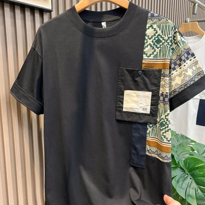 Black t-shirt with patterned patch on a hanger