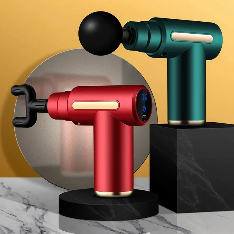 Red and green handheld massagers on black stands with a yellow background