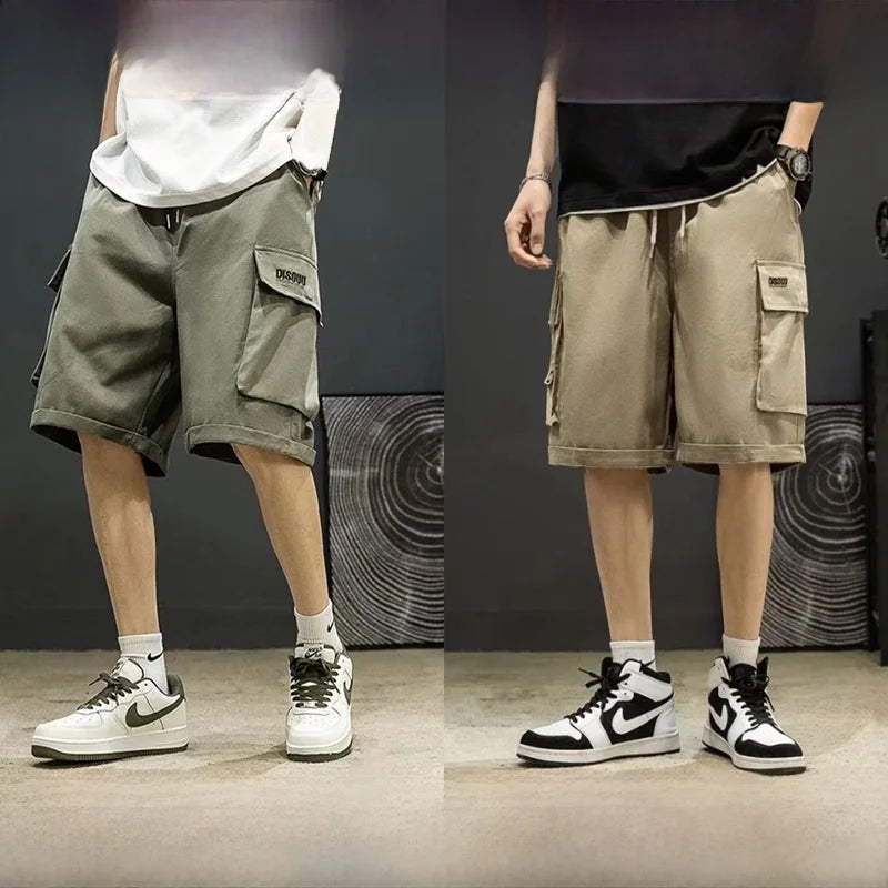 Two pairs of cargo shorts worn by models with matching sneakers on a dark background.