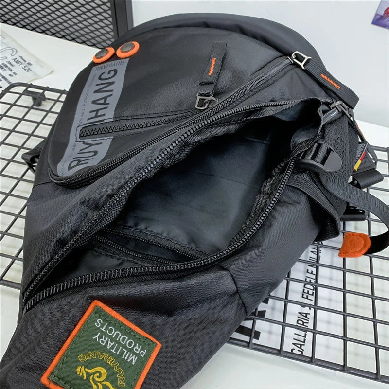 Black backpack with visible branding on a metal grid background