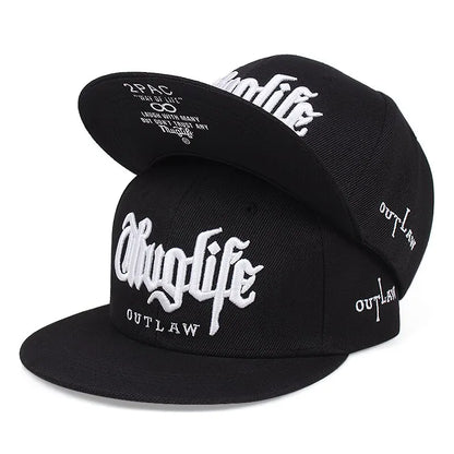 Black caps with 'Chuglife' and 'Outlaw' text on a white background