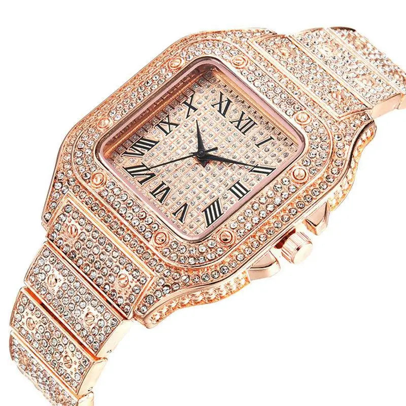 Rose gold watch with diamond-studded band on a white background