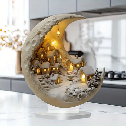 Decorative moon lamp with a snowy village scene on a kitchen counter.