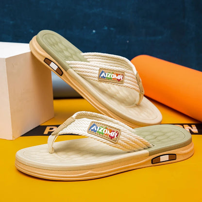 Pair of sandals with a visible brand logo on a colorful background