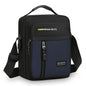 Black and blue shoulder bag with visible branding on a white background