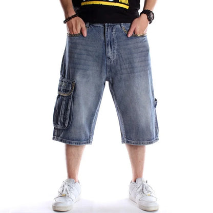 Person wearing light blue denim shorts on a white background
