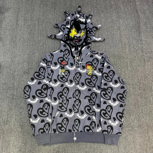 Gray hoodie with black and white pattern on a gray background