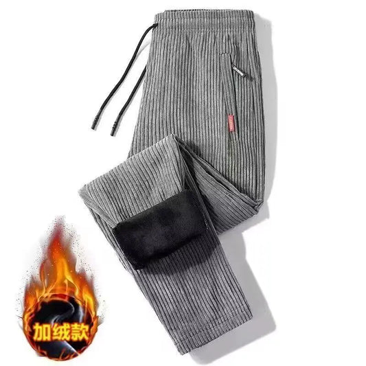 Gray thermal pants with a flame icon and text on a white background