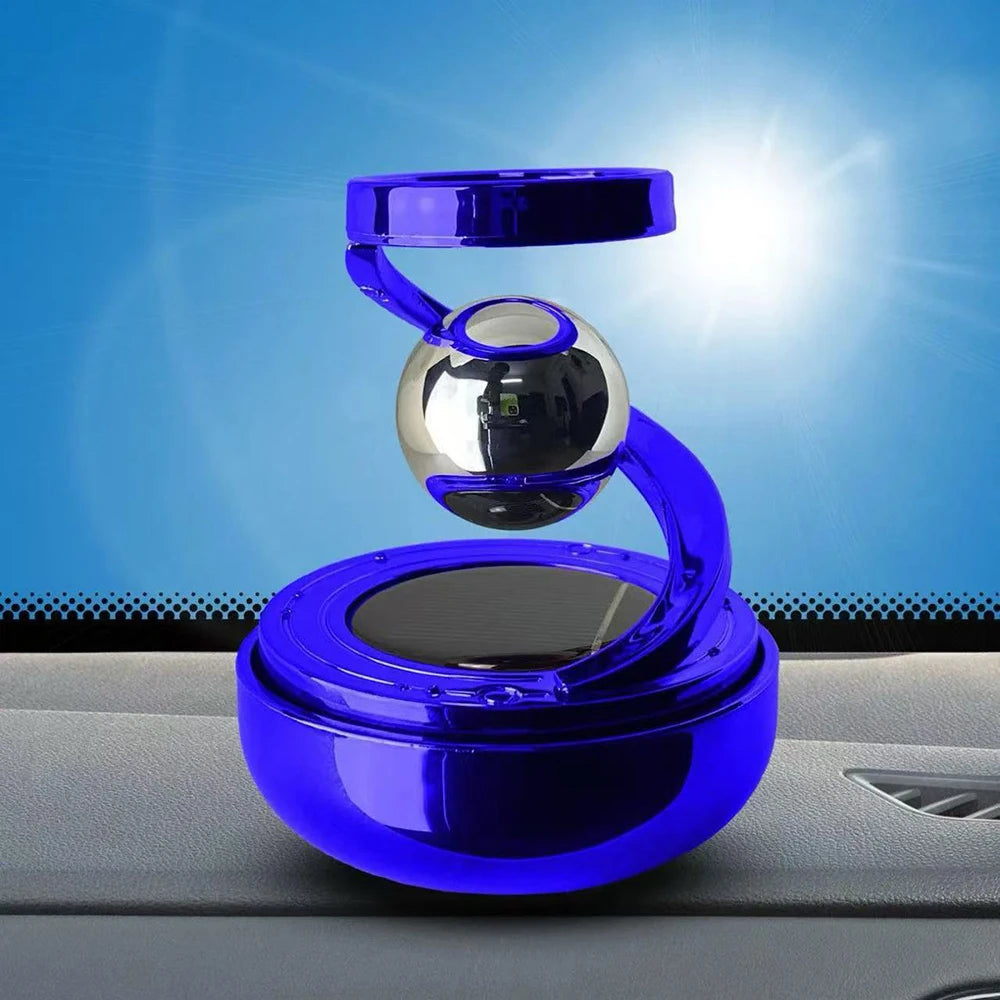 Blue and silver levitating sphere device on a car dashboard with a blue gradient background