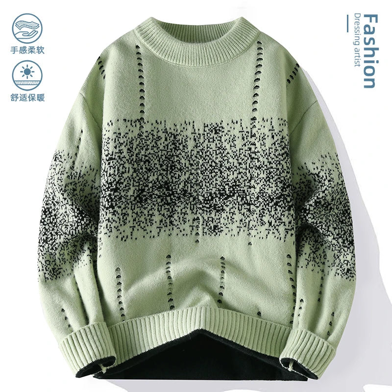 Green sweater with black pattern on a white background
