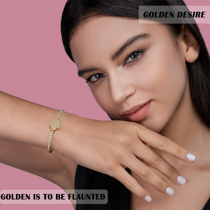 Woman wearing a gold bracelet on a pink background with 'Golden Desire' branding.