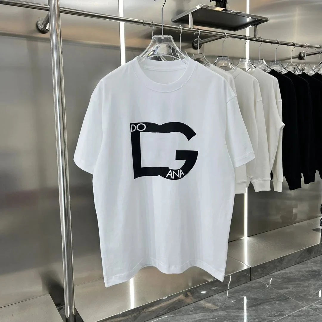 White t-shirt with black logo on a rack in a store