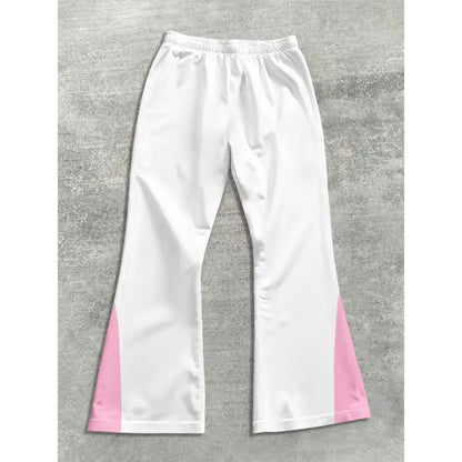 White pants with pink accents on a gray background