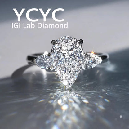Diamond ring with 'YCYC IGI Lab Diamond' branding on a reflective surface.