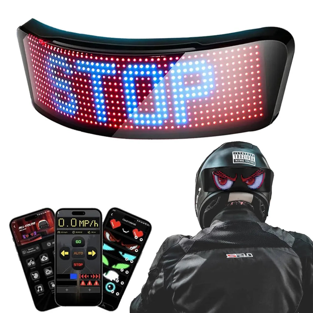 LED sign displaying 'STOP' with a person wearing a helmet and jacket in the background